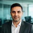 Portrait of Jilo Lungrin in a modern office with soft natural light